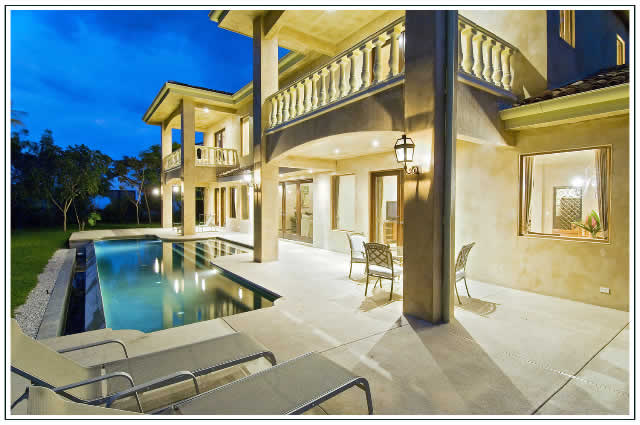 The home faces the pool.